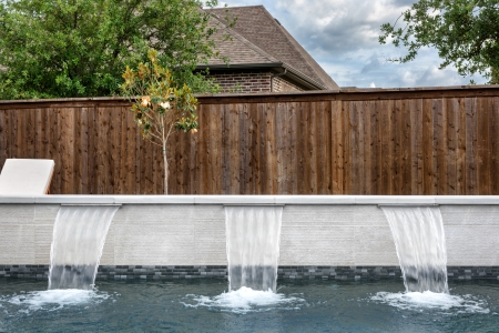 Stunning geometric pool with cantilever cover
