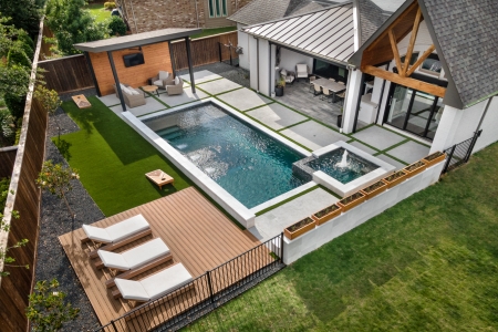 shot of swimming pool in backyard