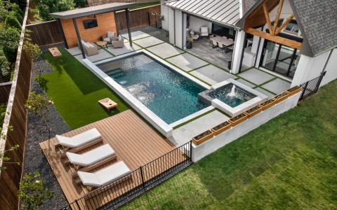 shot of swimming pool in backyard