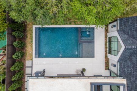 Aerial view of a square pool and stone walkway