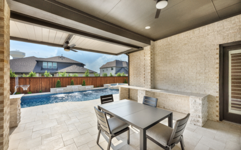 Table and chairs near a pool