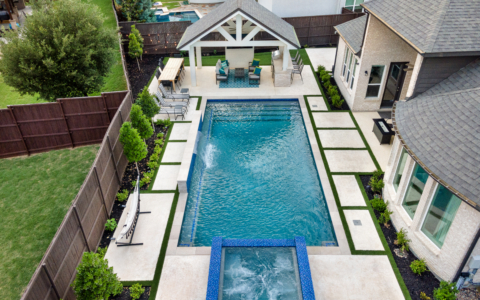 Aerial view of a hot tub and pool on a patio