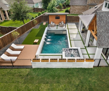 Pool with a fountain and outdoor patio