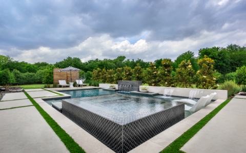 Square hot tub near waterfalls