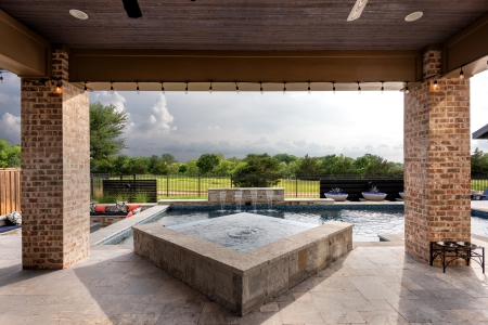 Waterfalls and a pool in an outdoor space