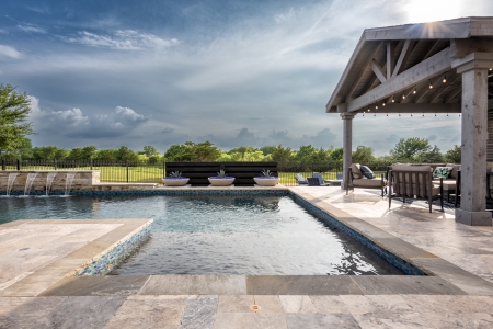 Pool with a large outdoor kitchen