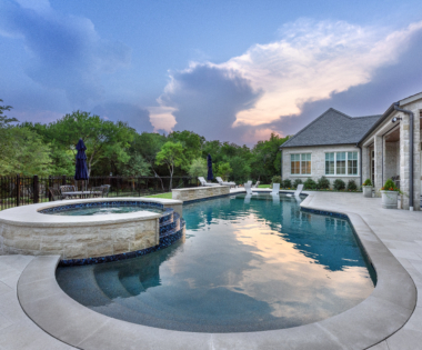 freeform pool at dusk
