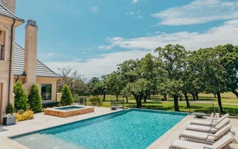 Pool on a sunny day with chairs
