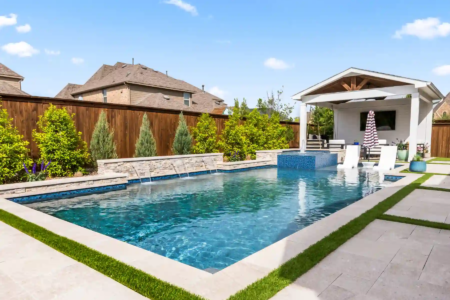 Sitting area and waterfalls into a pool