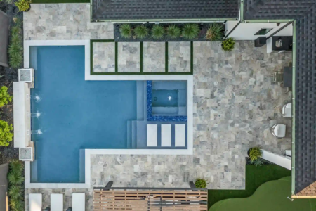Aerial view of a swimming pool and outdoor area