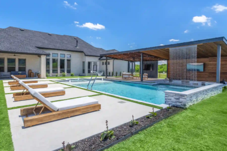 Lounge chairs near an outdoor pool
