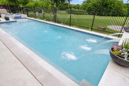 Fountains pouring into a pool at intervals