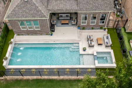 Aerial view of an outdoor pool and sitting space